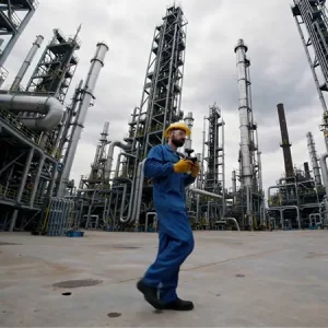 Inspector capturing visual inspection AI footage at oil and gas facility